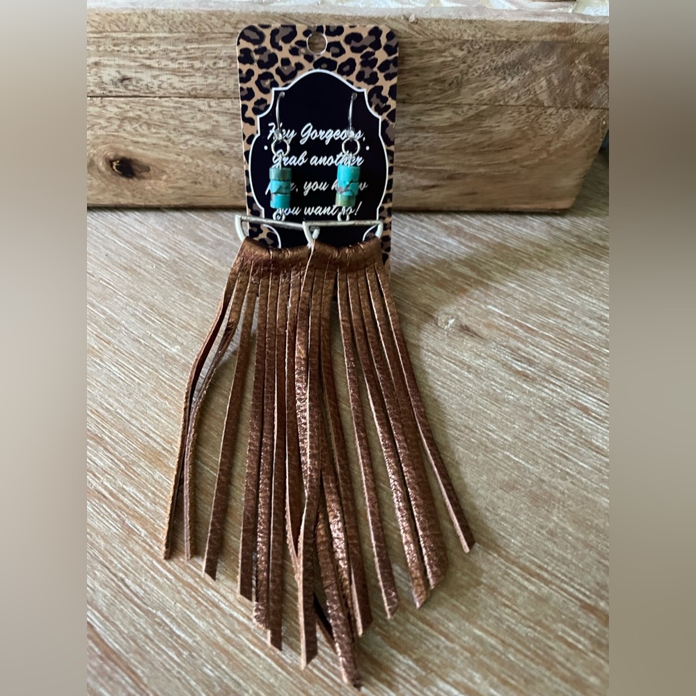 Turquoise and leather fringe earring